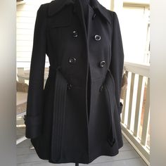 Here We Have The Classic Winter Wool Peacoat From The Discontinued Victoria’s Secret Peacoat Line Perfect For Fall/Winter Stay Cozy With Style 60% Wool, Very Warm True Size 2 Perfect For Smaller Or Petite Frames That Don’t Want To Drown In Wool Coat!! Belt At Waist And Skirted Bottom Makes This Beautiful Coat Stylish And Feminine Cinches The Waist For Accentuated Figure Looks Particularly Gorgeous With Skinny Jeans, Booties, Or Heels. Looks Beautiful With Belt On Or Loosened Immaculate Condition Black Pea Coat For Cold Weather, Elegant Black Peacoat With Pockets, Victoria's Secret Long-sleeved Winter Outerwear, Victoria's Secret Long Sleeve Winter Outerwear, Victoria's Secret Winter Outerwear, Coat Belt, Wool Peacoat, Stay Cozy, Wool Coat