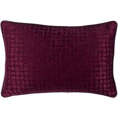 a purple velvet pillow on a white background