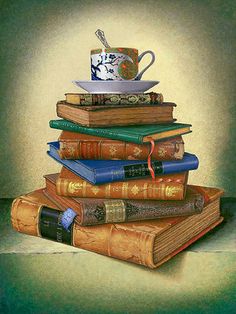 a stack of books with a coffee cup on top of one and a teacup on the other