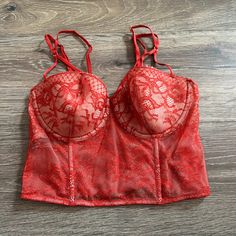 Nwt Victoria's Secret; Size 34c; Adjustable Straps; Side Zipper; Underwire With Light Padding; Sheer Lace With Lined Cups; Polyamide/Elastane/Polyester; Hand Wash Comes From A Smoke Free, Pet Friendly Home. Please Ask All Questions About An Item Before Making An Offer. Offers Are Welcome! Bundle For The Best Deal! No Modeling Or Trades. Happy Poshing! Red Corset Top, Lace Corset Top, Red Corset, Corset Bra, Red Bra, Black Lace Bralette, Lace Bustier, Victoria Secrets, Black Corset