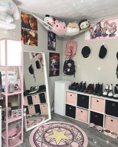 a room filled with lots of pink and white furniture next to a star shaped rug