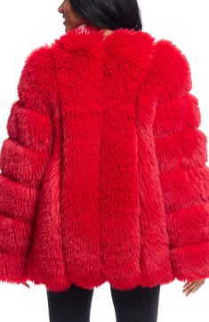 Soft-to-the-touch faux fur means luxurious texture in this statement-making jacket that's perfect for cool nights on the town. 28" length Front hook-and-eye closure Jewel neck On-seam pockets Lined 100% polyester faux fur Dry clean Imported Luxury Fluffy Fur Coat For Fall, Red Fur Coat With Faux Fur Trim, Luxury Faux Fur Outerwear With Feather Trim, Luxury Faux Fur Coat For Fall, Luxury Fluffy Faux Fur Outerwear, Luxury Faux Fur Coat With Faux Fur Trim, Luxury Faux Fur Outerwear With Fur Trim, Luxury Outerwear With Faux Fur Trim, Red Faux Fur Coat