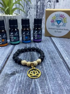 * When wearing your diffusing Bracelet, YOU are receiving the healing prosperities of the natural gemstone and balancing energy from the lava stones. 🖤✨ Creating handmade unique meaningful jewelry pieces designed to inspire you! Visit my shop  https://create2inspireone.etsy.com 🌟Details & Material: * Aromatherapy Diffuser Bracelet  *Elastic Cord (Adjustable to your wrist)  *Lava Rocks  *Gold Spacers  *bamboo beads  *Jump rings  *Lotus Flower Charm  *Jewelry box to keep your bracelet safe *essential oils included (3 mini bottles)  *Rub 1-2 drops of essential oil's on the lava stones, Re-apply same or different essential oil when aroma fades. ** ANY essential oil you like** personal preference  The pictures above are my personal favorites ~ Have fun with it- use any kind of essential oil's Spiritual Lava Stone Stretch Bracelet Gift, Adjustable Lava Stone Stretch Bracelet Gift, Bohemian Lava Stone Bracelets For Gift, Bohemian Lava Stone Beaded Bracelets Gift, Bohemian Lava Stone Bracelet As Gift, Bohemian Lava Stone Beaded Bracelet Gift, Holistic Beaded Stretch Bracelet As Gift, Rock Bracelets, Lava Rock Jewelry