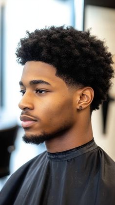 The Afro with Low Taper Fade combines volume and precision for a bold, clean look. It's perfect for showcasing natural texture with a sharp finish. Click the pin and follow us for more style inspiration! #AfroHair #LowTaperFade #NaturalCurls #MensHaircuts #FadeStyle Hairstyle Fade Men, Men Haircut Styles Black Man, Taper Fade For Short Hair, Bushy Hair Hairstyles Men, Names Of Haircuts Men, Low Cut Taper Fade Black Men Hair, The Duke Haircut, Taper Fade 4c Hair, Afro Haircuts For Men