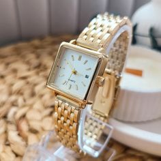 Technical specifications: ➡ Movement: Quartz ➡ Case Material: Gold colour metal ➡ Dial : White with gold-tone markers(with date counter) ➡ Bracelet: Gold colour metal link bracelet ➡ Case Shape: Square ➡ Clasp Type: Clasp ➡ Display: Analog ➡ Case Diamensions: 20*20 mm ➡ Crystal: Mineral glass ✈ Free shipping Discover the elegance of this beautiful womens wrist watch, crafted in luxurious gold. This gold womens watch is not just a timepiece but a statement of style. With its unique womens watch d Adjustable Gold Watch With Round Dial, Gold Metal Watch Accessories With Metal Dial, Gold Watches For Women, Unique Watches Women, Date Bracelet, Vintage Gold Watch, Gold Watches, Watches For Women, Watch Vintage