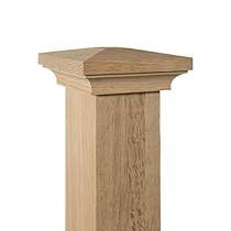 a wooden pedestal with an open top on a white background