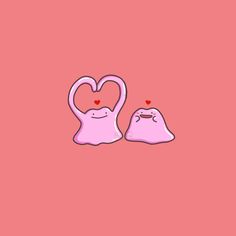 two heart shaped objects on a pink background