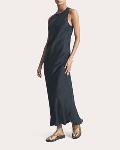 Rooted in pared-back luxury, the Valencia slip dress tailors its silk silhouette with bias-cut seams to glide effortlessly down your figure. The high neckline exudes sophisticated appeal. Back hook-and-eye closure Bias-cut seams 100% silk Dry clean only Made in China Size & Fit Garment measurements (size S): 51.38in long from high point of shoulder to hem, 38.58in bust, 37.01in waist, 41.34in hips Model (wearing size S): 5ft 8in tall Fits true to size Size XS = US 2-4 / UK 6-8 Size S = US 4-6 / Silk Charmeuse, Dry Clean Only, High Point, High Neckline, Valencia, Slip Dress, Black Dress, Dry Clean, Maxi Dress