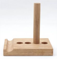 a wooden stand with holes in it