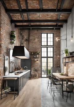 an industrial style kitchen and dining room with exposed brick walls, flooring and wooden floors