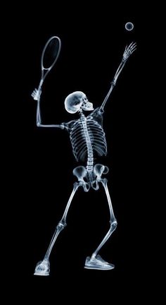 a skeleton is playing tennis with a racket in its hand and holding the ball