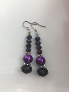 "*Handmade item, one-off design *Materials: black and purple metallic rondelles, purple glass pearls, silver-plated daisy spacers, sterling silver hooks, beaded on earring pins  *Earring length: approximately 2.5\" [6 cm] including the hooks   Includes gift box 4cm x 5cm" Earring Pins, Purple Metallic, Earring Ideas, Black And Purple, Purple Glass, Pearl Drop Earrings, Pearl Drop, Purple Black, Purple And Black