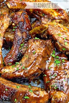 the ribs are covered in bbq sauce and garnished with parsley