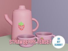 a pink tea pot and two cups with strawberries on the side, sitting next to each other