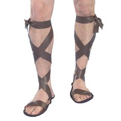 Conjure the look of a Roman warrior with these Roman Sandals for Adults! Step into the Halloween party in style with these unique sandals featuring a leather look and straps that can be tied under the knee for a great Greek/Roman style! Pair these sandals with our other Roman-inspired Halloween accessories to conquer the Halloween costume party! Find even more Halloween costume gear and easy costume ideas on our website.Special Shipping Information: This item ships separately from other items in Diy Leather Sandals, Gladiator Costumes, Roman Man, Roman Costume, Roman Warriors, Diy Sandals, Halloween Shoes, Goddess Costume, Flat Gladiator Sandals