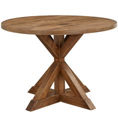 a round wooden table with four legs and a cross design on the top, against a white background