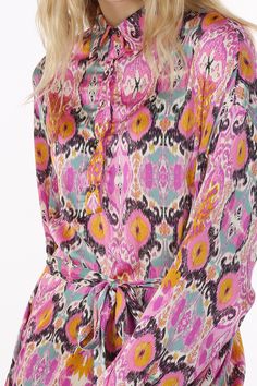 Multicolor satin fabric Multi print abstract design 5-button Henley collar High low hem Long sleeves, single button cuffs Self waist tie included Midi length Regular fit Imported Model is 5'10" wearing a One Size Available in Red & Purple 100% POLYESTER Caring for your clothes is caring for the environmentWash your clothes with lower temperature and delicate spin cycles. It helps to maintain the color, shape and structure of the fabric. At the same time it reduces energy consumption that is used Spin Cycle, High Low Hem, Red Purple, Waist Tie, Dress First, Midi Length, Satin Fabric, High Low Dress, Collar