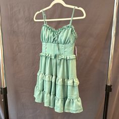 Aqua Green Wild Fable Sleeveless Short Dress With Adjustable Straps. New With Tags. Sundress With Ruffled Straps For Day Out, Green Mini Sleeveless Dress With Ruffles, Green Sleeveless Mini Dress With Ruffles, Sleeveless Summer Mini Dress With Ruffle Hem, Sleeveless Ruffled Dress With Spaghetti Straps For Brunch, Sleeveless Casual Mini Dress With Ruffle Hem, Green Sleeveless Ruffled Sundress, Green Sleeveless Sundress With Ruffles, Spring Sleeveless Dress With Ruffled Straps For Day Out