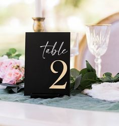 a table number sitting on top of a table