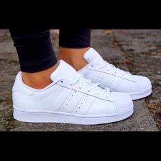 The Timeless Sneaker Features Supple Leather And Iconic 3-Stripes Branding. Runs Large, Leather, White Brand New All White Superstars, White Adidas Superstar, All White Adidas, Burgundy Nikes, Adidas White Shoes, Adidas Sneakers Women, Adidas Shoes Women, Adidas Originals Superstar, Adidas White