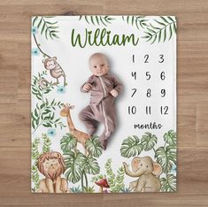 a baby's birth announcement with an elephant, giraffe and monkey on it