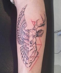 an owl and deer tattoo on the left arm, with triangles in the middle to represent two different animals