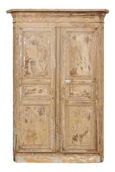 an old wooden cabinet with two doors