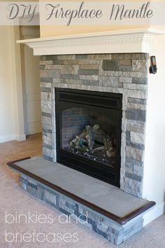 a stone fireplace with the words diy fireplace mantle written above it in white lettering