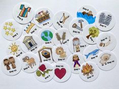 a bunch of buttons that have different pictures on them with the words days of the week