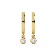 Small gold hoop earrings featuring a dangling 0.10 CT diamond on each hoop, securely set in a bezel setting.Details: - Made to Order- Diamond Weight: 0.20 CT - No of Diamonds: 2- Diamond Type: Lab Grown Diamond (CVD, HPHT)- Diamond Cut: Round- Diamond Clarity: VS - Diamond Color: Colorless (DEF)- Setting Type: Bezel- Metal Type: 14K Solid Gold,18K Solid Gold- Choice of Gold Color: Yellow Gold, White Gold, Rose Gold- Jewelry Certification: Jewelry priced above $500 includes Third Party Lab Certif Yellow Gold Huggie Earrings With Bezel Setting As Gift, Yellow Gold Huggie Earrings Gift, Yellow Gold Bezel-set Dangle Diamond Earrings, Yellow Gold 14k Huggie Earrings With Bezel Setting, Gold Dangle Diamond Earrings With Bezel Setting, Anniversary Gold Huggie Earrings With Bezel Setting, Gold 14k Huggie Earrings With Bezel Setting, Gold Hoop Earrings With Bezel Setting, Gift Huggie Hoop Earrings With Bezel Setting