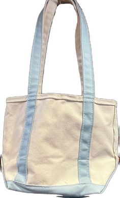 Casual Light Blue Everyday Bag, Light Blue Large Capacity Bag For Everyday, Light Blue Casual Rectangular Bags, Casual Light Blue Rectangular Shoulder Bag, Light Blue Square Shoulder Bag For Daily Use, Casual Blue Canvas Bag For Everyday, Everyday Light Blue Rectangular Shoulder Bag, Blue Trendy Canvas Bag For Everyday Use, Trendy Blue Canvas Bag For Everyday Use