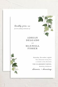 an elegant wedding card with greenery on the front and back, in black ink