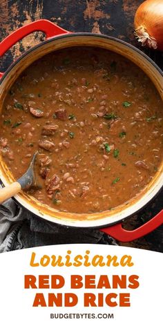 a red pot filled with beans and rice