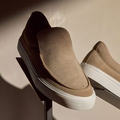 Our Coastal Suede Slip On is made with leather with vulcanized rubber outsole, adding flexibility and stability. Style detail includes leather lining. Additional Information:• 100% Leather • Leather lining, Removable Leather Insole • Imported Modern Slip-on Leather Shoes With Vibram Sole, Suede Slip-on Leather Shoes With Textured Sole, Modern Leather Slip-on Sneakers With Vibram Sole, Luxury Suede Slip-ons With Textured Sole, Masculine Suede Slip-on Loafers, Denim Polo, Decorative Bath Towels, Sweat Top, Jumpsuit Jacket