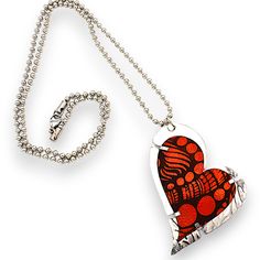 Enamel & Steel Necklace - Made from recycled copper, this heart pendant showcases a stunning laser engraved design that radiates charm and sophistication; its enameled finish adds a touch of vibrant color. Set on non-tarnish, roller-printed stainless steel; lobster clasp closure. Silver Enamel Heart Pendant Necklace, Handmade Heart-shaped Enamel Jewelry, Heart-shaped Orange Jewelry For Gift, Artistic Silver Heart Necklace, Orange Heart-shaped Jewelry Gift, Heart-shaped Orange Necklace For Gift, Orange Heart Charm Jewelry, Mixed Media Necklace, Shrinky Dink