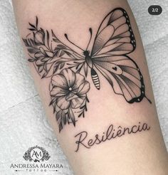 a black and white photo of a butterfly with the word resilicia on it