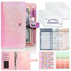 a pink case with lots of glitter on it and several different items in the package