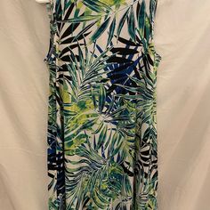 This Women's Swing Dress From Ab Studio Adds Undeniable Beauty To Your Wardrobe. Product Features Ruffle Detail At Armhole And Neckline Scoopneck Sleeveless Side Pockets White Stretch Sleeveless Dress For Vacation, Green Stretch Sleeveless Dress For Vacation, Sleeveless Dress Casual, White Knee Length Dress, Summer Tank Dress, Studio Green, Ab Studio, Grey Sweater Dress, Womens Shift Dresses