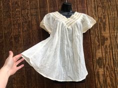 "An ethnic, summer festive blouse. Slightly sheer.  No tags - estimated medium - please see measurements. Condition - great!.   Measurements taken across front laid flat Bust19\" Shoulder to hem29\" Waist28\"" Peasant Style Flowy Blouse For Festivals, Flowy Peasant Blouse For Festival, Flowy Summer Blouse With Boho Collar, Flowy Summer Tunic Peasant Top, Flowy Peasant Tunic Top For Summer, White Hippie Blouse For The Beach, Flowy Boho Collar Blouse For Summer, White Hippie Blouse For Beach, White Peasant Top With Boho Collar For Summer