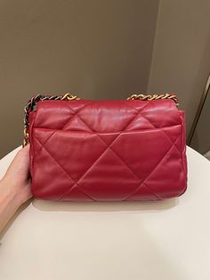 Chanel 19 Flap BagDark Red AGHWSmall 26 x 17 x 8 cmChain drop 46 cm28 Series9.5/10 Excellent (tiny dot mark at back area and minimal leather signs of use otherwise excellent)Includes box, dust bag and ity cardRTP 9160 sgd Price now 5200 sgd 3900 usd CN6020-01 Designer Burgundy Rectangular Bag, Red Designer Bag With Double Flap, Red Designer Bags With Double Flap, Designer Red Double Flap Bag, Luxury Red Flap Bag With Removable Pouch, Luxury Red Flap Bag For Daily Use, Red Formal Bags With Double Flap, Designer Red Flap Bag For Shopping, Classic Red Flap Bag For Shopping