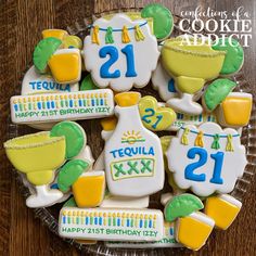 decorated cookies in the shape of baby's first birthday