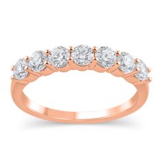 From the REEDS Exclusive ECONIC Diamond collection, this stunning 14k rose gold anniversary ring is the perfect and complete gift to celebrate your romantic journey together. The anniversary ring boasts seven sparkling round ECONIC lab grown diamonds in a prong setting. The lab grown diamonds are 1ctw, I in color, and SI1 in clarity. The anniversary ring is 3mm across the top and 2mm at the bottom. REEDS exclusive ECONIC Diamonds are lab grown in a technologically advanced facility, allowing us Rose Gold Half Eternity Diamond Anniversary Ring, Rose Gold Diamond Ring Channel Set For Anniversary, Rose Gold Channel Set Diamond Ring For Anniversary, Gold Anniversary Bands, Gold Anniversary Rings, Wedding Day Jewelry, Diamond Collection, Gold Anniversary, Engagement Ring Guide