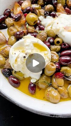 an image of olives and eggs in a bowl