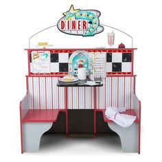 the diner booth is set up to look like it's ready for someone to order