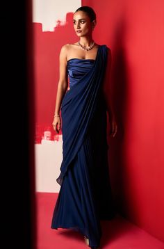 Ridhi Mehra-Shiza Navy Draped Corset And Sari-INDIASPOPUP.COM Luxury Blue Pre-draped Saree With Resham Embroidery, Luxury Blue Pre-draped Saree With Motifs, Luxury Elegant Georgette Pre-draped Saree, Luxury Blue Saree With Ruffles, Luxury Blue Unstitched Saree, Luxury Royal Blue Dupatta In Traditional Drape, Luxury Semi-stitched Pre-draped Saree, Luxury Traditional Pre-draped Saree For Evening, Luxury Blue Pre-draped Saree For Celebration