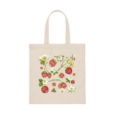 a tote bag with strawberries and daisies on it