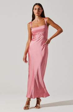 Satin maxi dress Concealed zipper closure on back Partially lined Slight padding on bodice, boning on sides Dry clean only Self: 100% Polyester / Lining: 95% Polyester 5% Elastane Style# ACDR102095 Pink Silk Dress, Luxurious Dresses, Strawberry Pink, Pink Formal Dresses, Pink Bridesmaid Dresses, Astr The Label, Lilac Dress, Satin Maxi