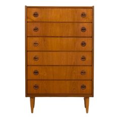 an old chest of drawers with wooden handles and knobs on the front, against a white background