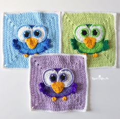 three crocheted owls sitting on top of each other in front of a white wall