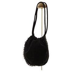 An ample handbag from vintage Chantal Thomass is constructed of soft black velvet. The flap features black lace ruffle embellishments. Beneath the flap is a deep pouch secured with a black drawstring cord. Carry it with confidence as you shoulder the two velvet straps. Elegant Black Velvet Bag, Elegant Black Velvet Bags, Black Velvet Evening Bag For Formal Occasions, Elegant Black Velvet Evening Bag, Vintage Black Shoulder Bag With Dust Bag, Round Shoulder Bag, Chantal Thomass, Shoulder Bag Vintage, Vintage Soft